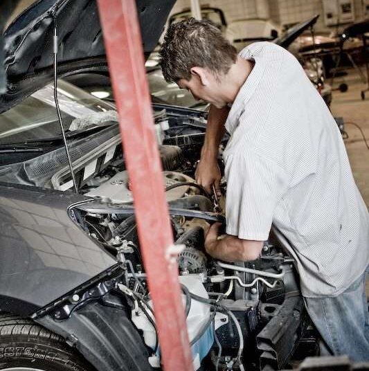 mechanical repair service tech working