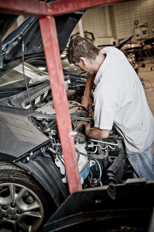 Lindenwood Transmission Repair - Mechanic Working on Car