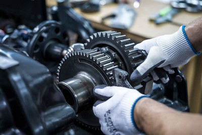 Technician with transmission parts-Benson Gardens transmission repair Technician with transmission parts-Benson Gardens transmission repair
